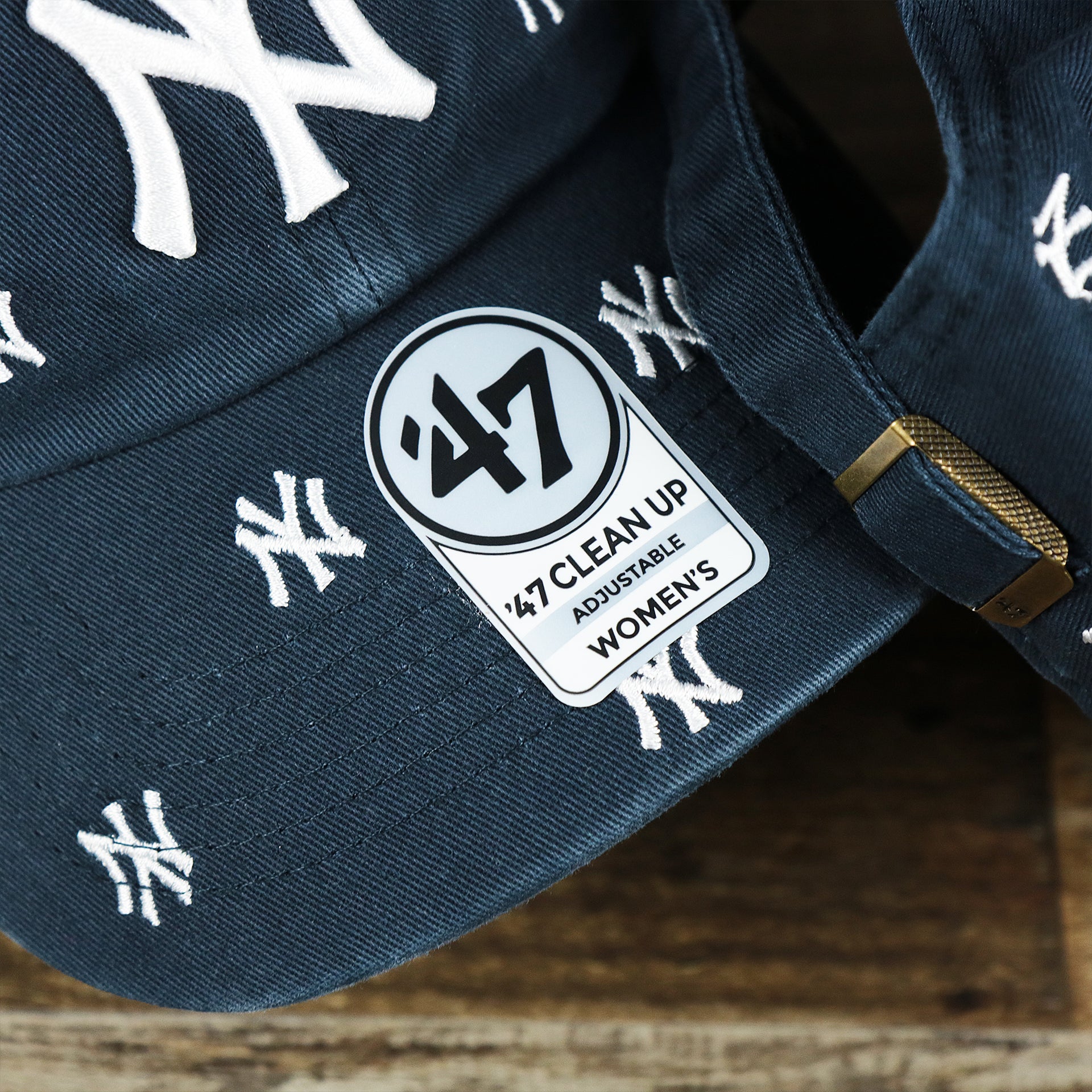 The 47 Brand Women's Sticker on the Women’s New York Yankees All Over Yankees Logo Dad Hat | Navy Women’s Dad Hat