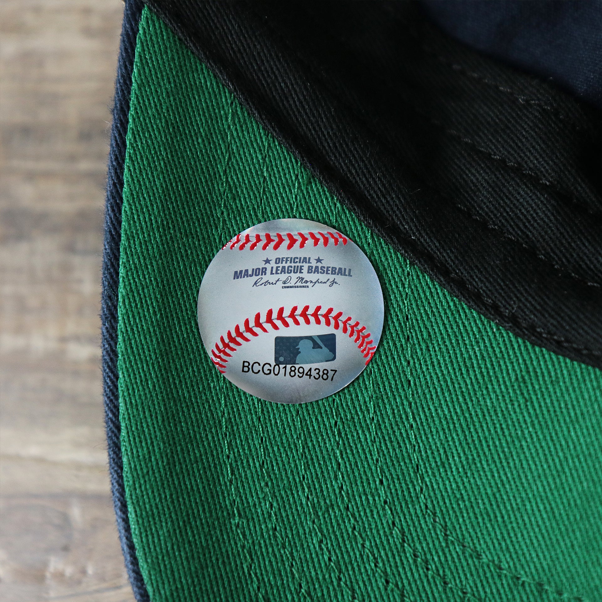 The MLB Sticker on the Cooperstown New York Yankees Green Bottom Mesh Back Snapback Cap | Navy Mesh Snapback