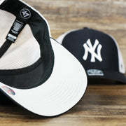 The undervisor on the New York Yankees Mesh Back Gray Bottom Trucker Hat | Navy Blue Dad Hat