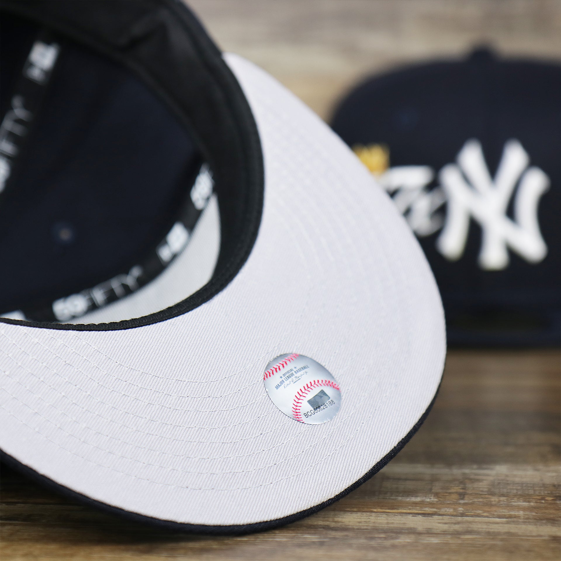 The undervisor on the New York Yankees Crown Champions Gray Bottom World Championship Wins Embroidered Fitted Cap | Navy Blue 59Fifty Cap