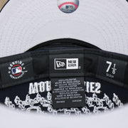 The Tags on the New York Yankees Crown Champions Gray Bottom World Championship Wins Embroidered Fitted Cap | Navy Blue 59Fifty Cap