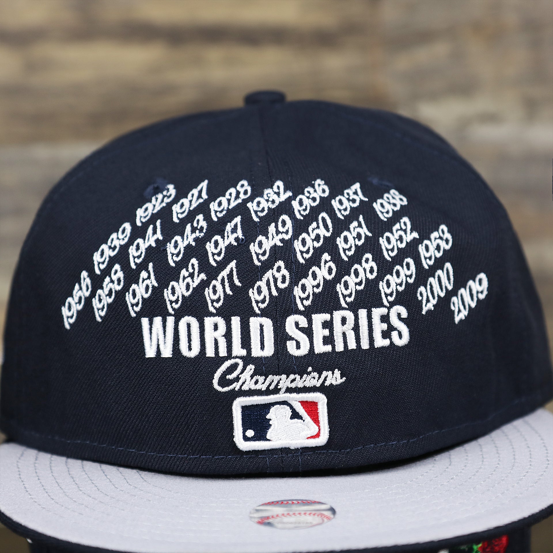 The World Series Wins on the New York Yankees Crown Champions Gray Bottom World Championship Wins Embroidered Fitted Cap | Navy Blue 59Fifty Cap