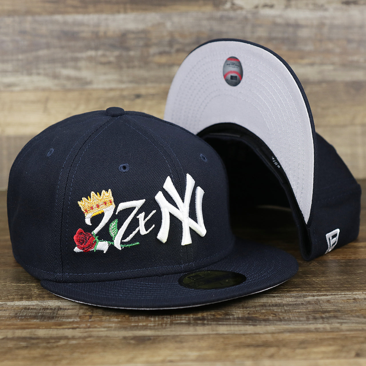 The New York Yankees Crown Champions Gray Bottom World Championship Wins Embroidered Fitted Cap | Navy Blue 59Fifty Cap