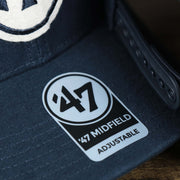 The 47 Sticker on the Cooperstown New York Yankees Felt Yankees Logo Snapback Hat | Navy Snapback Cap