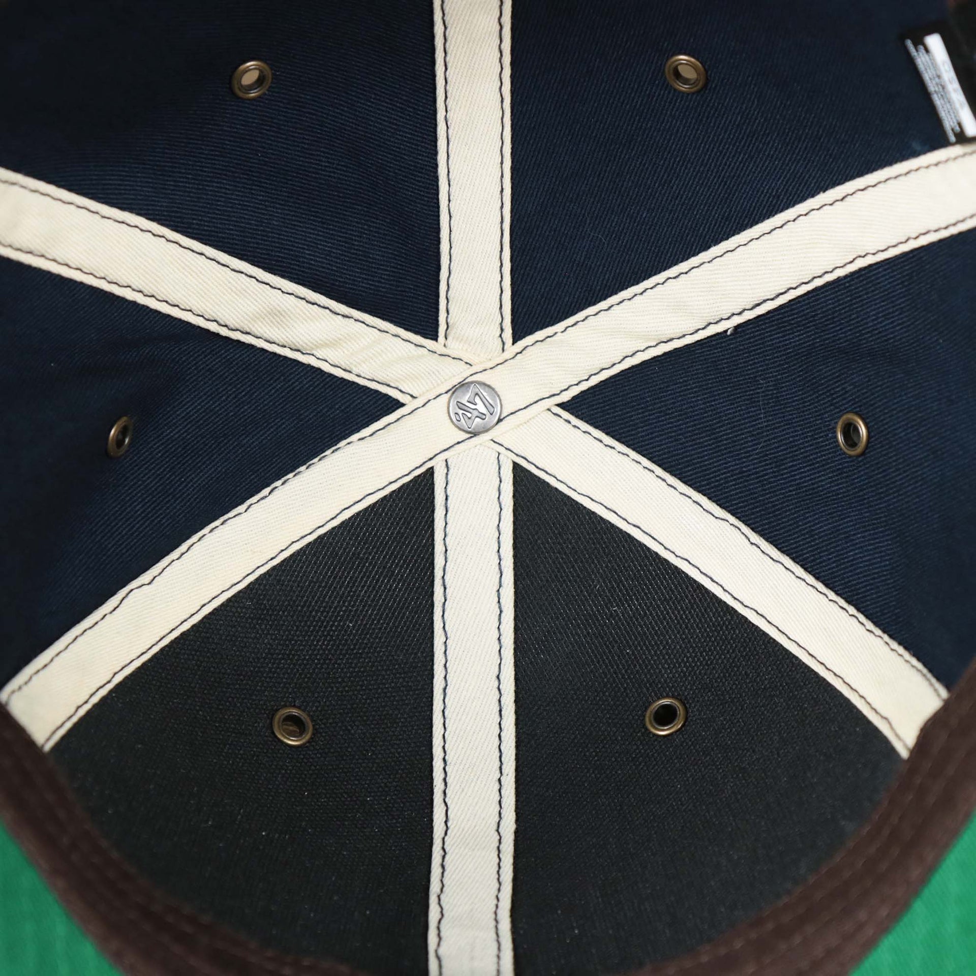 The inside of the Cooperstown New York Yankees Felt Yankees Logo Snapback Hat | Navy Snapback Cap