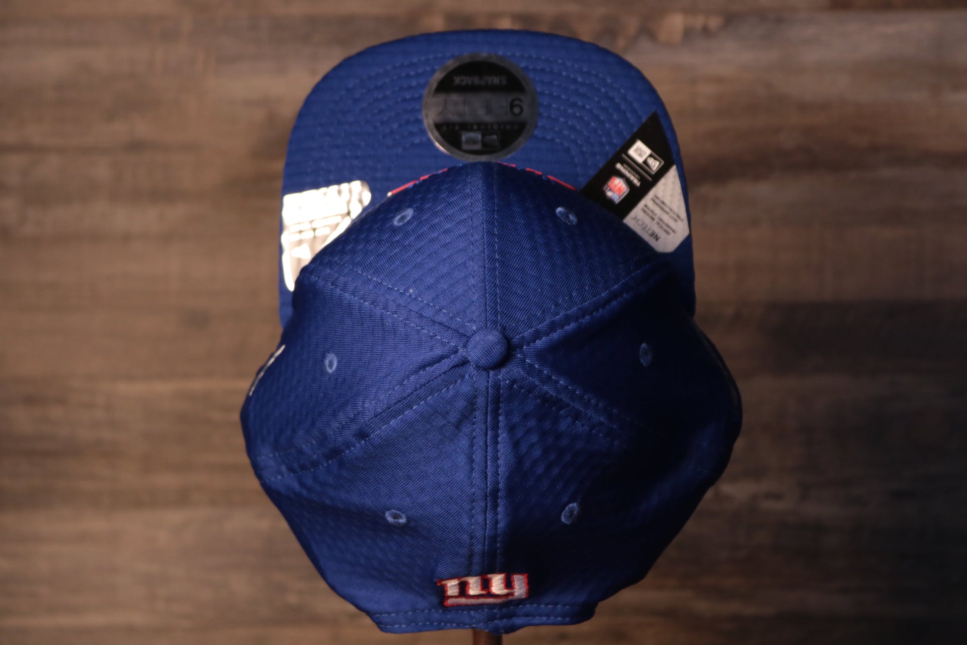 the top of this cap is blue Giants 2020 Training Camp Snapback Hat | New York Giants 2020 On-Field Red Training Camp Snap Cap