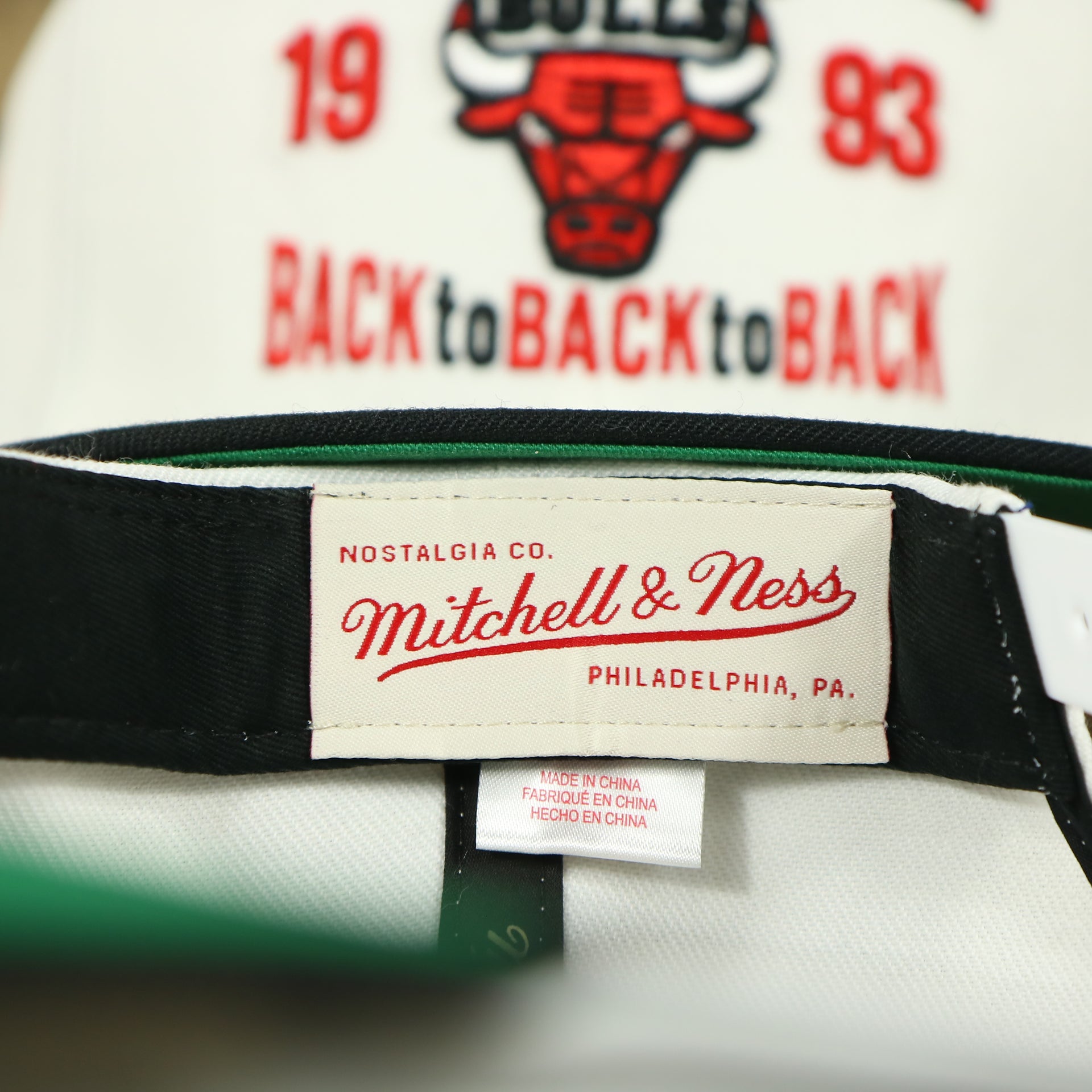 Mitchell and ness tag on the inside of the Chicago Bulls Vintage Retro NBA Champions 1993 Back To Back To Back Mitchell and Ness Snapback Hat | White