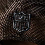 The back side of the grey/black Eagles 9fifty hat has the logo of NFL.