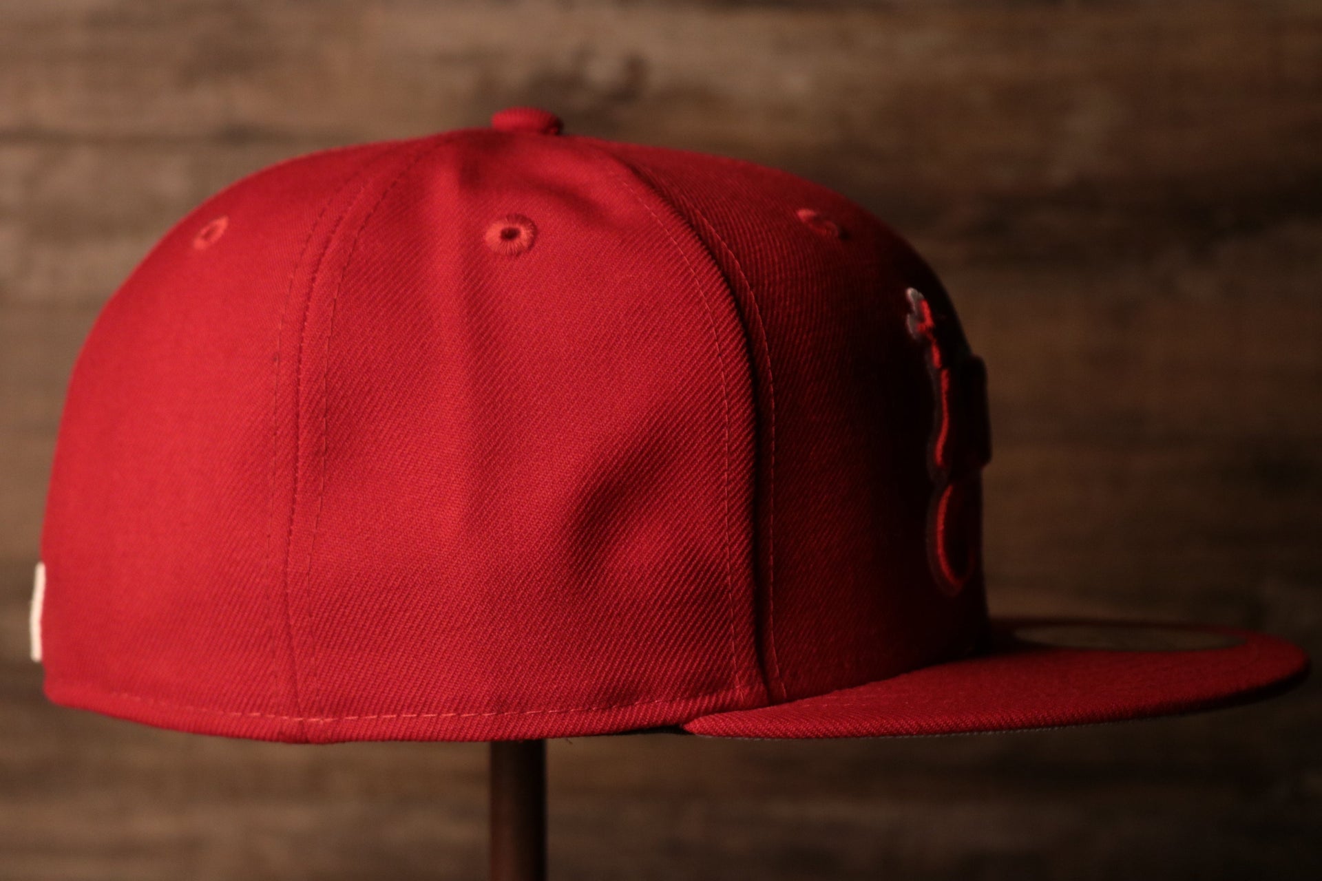 Grey Bottom Fitted Cap | Jawn Red Gray Bottom Fitted Hat the wearers right side is plain red