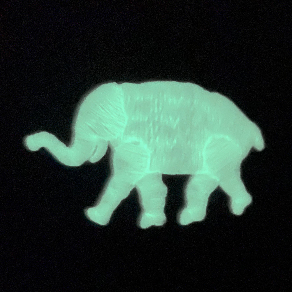 Glow in the dark elephant logo on the Philadelphia Athletics Glow In The Dark Oakland 40 Year Patch Teal Bottom Side Patch 59Fifty Fitted Cap