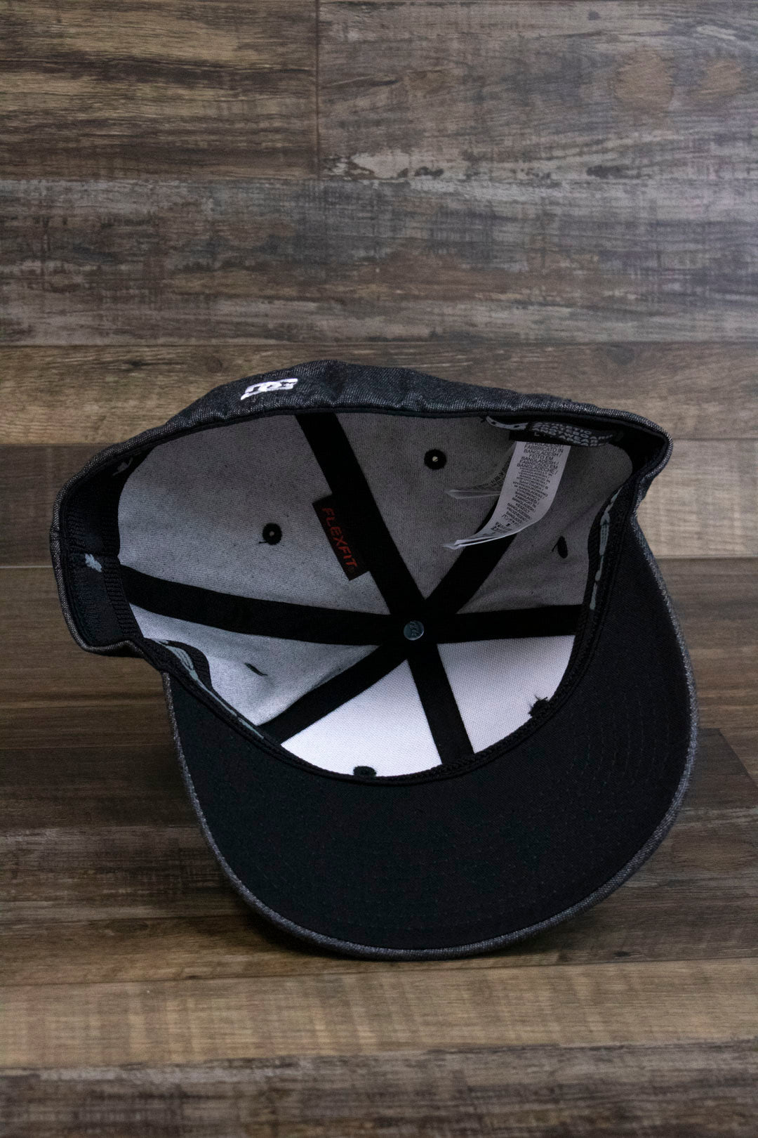 the Dark Gray Bentbrim Skater Hat | DC Shoes Black Bottom Heather Gray Flexfit Cap has a black underbrim