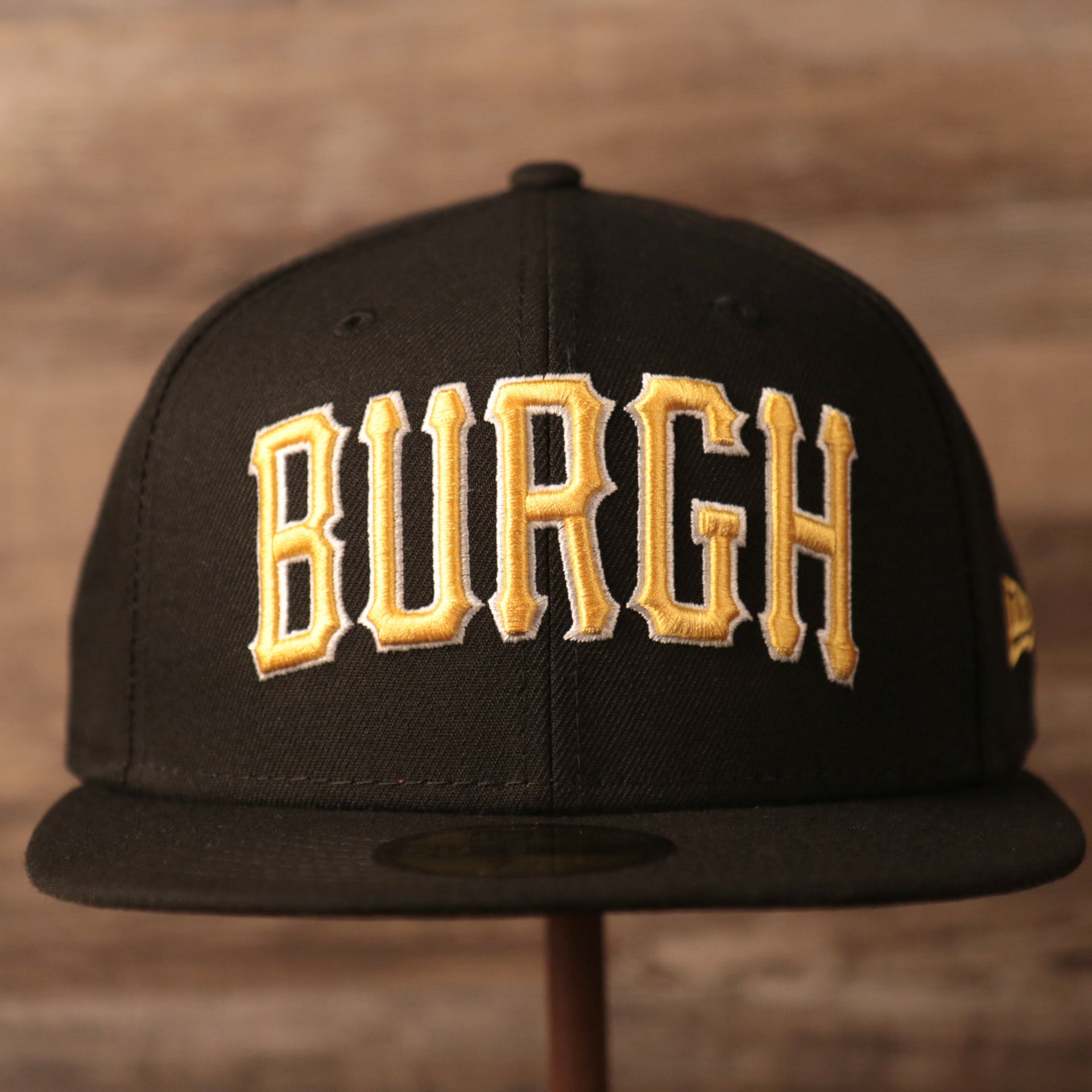 Pittsburgh Pirates black fitted 59fifty with Burgh on the front side.