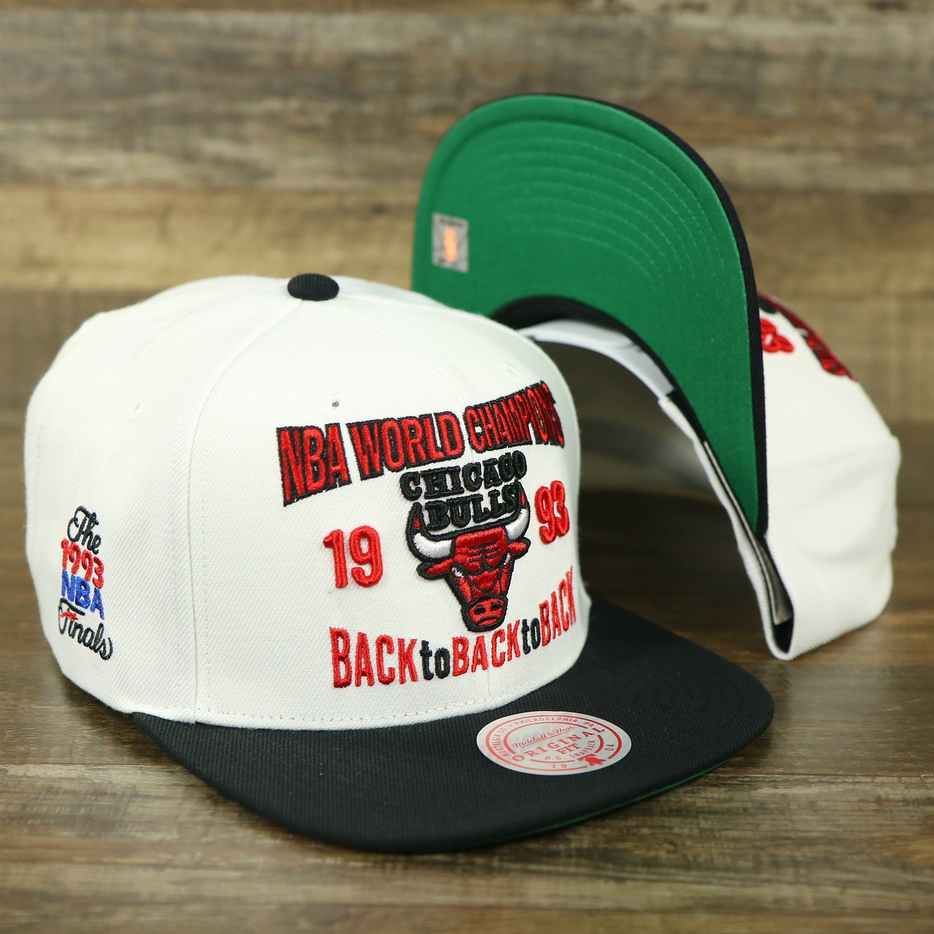 front and underbrim of the Chicago Bulls Vintage Retro NBA Champions 1993 Back To Back To Back Mitchell and Ness Snapback Hat | White