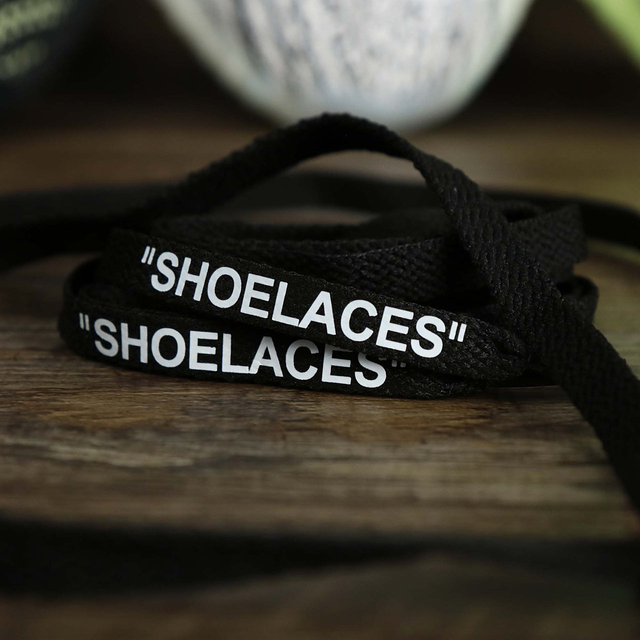 The Flat Black Shoelaces with “Shoelaces” Print | 120cm Capswag