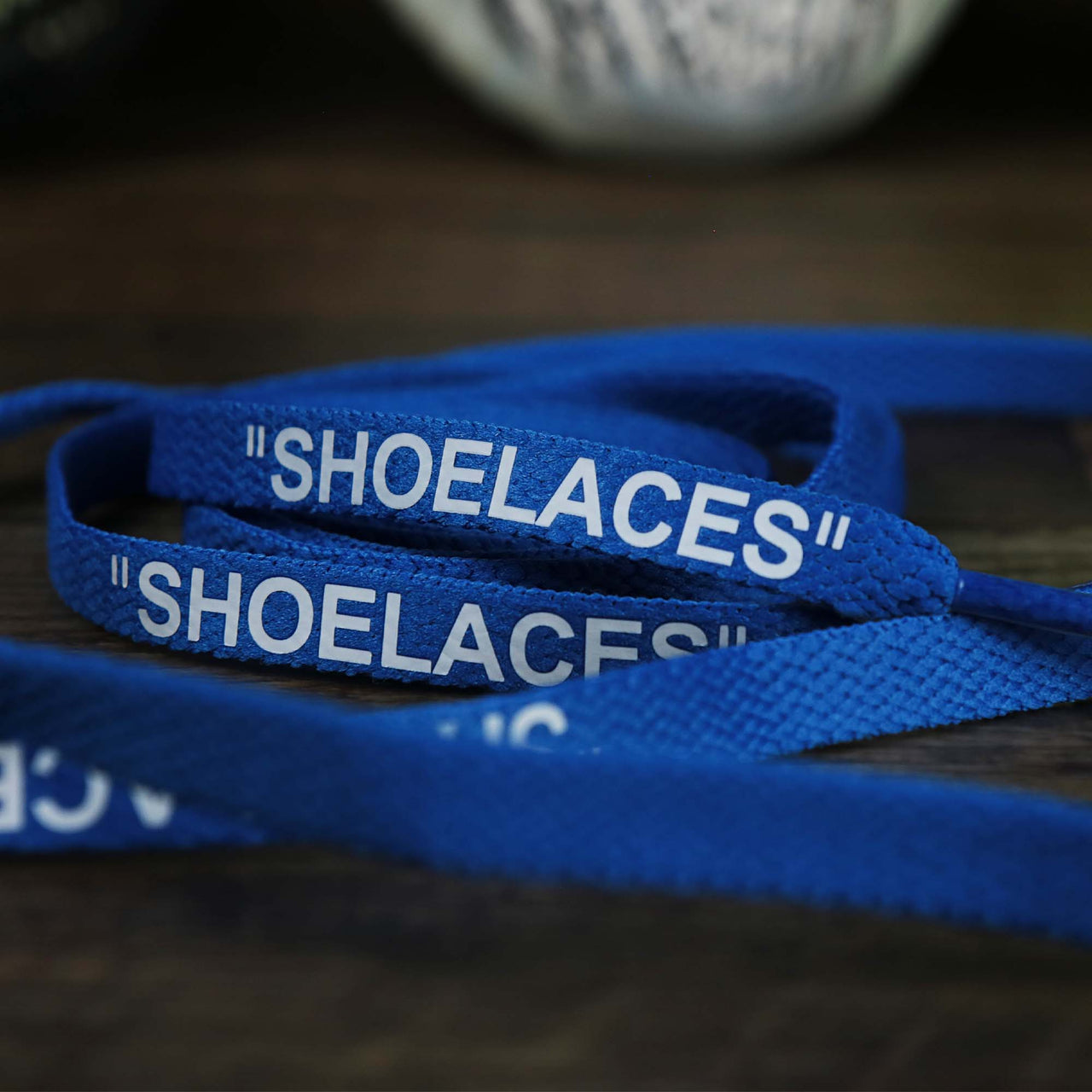 The Flat Blue Shoelaces with “Shoelaces” Print | 120cm Capswag unfolded