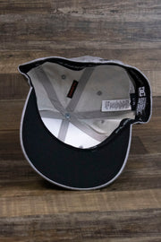 the Light Gray Bentbrim Skater Hat | DC Shoes Black Bottom Heather Gray Flexfit Cap has a black underbrim