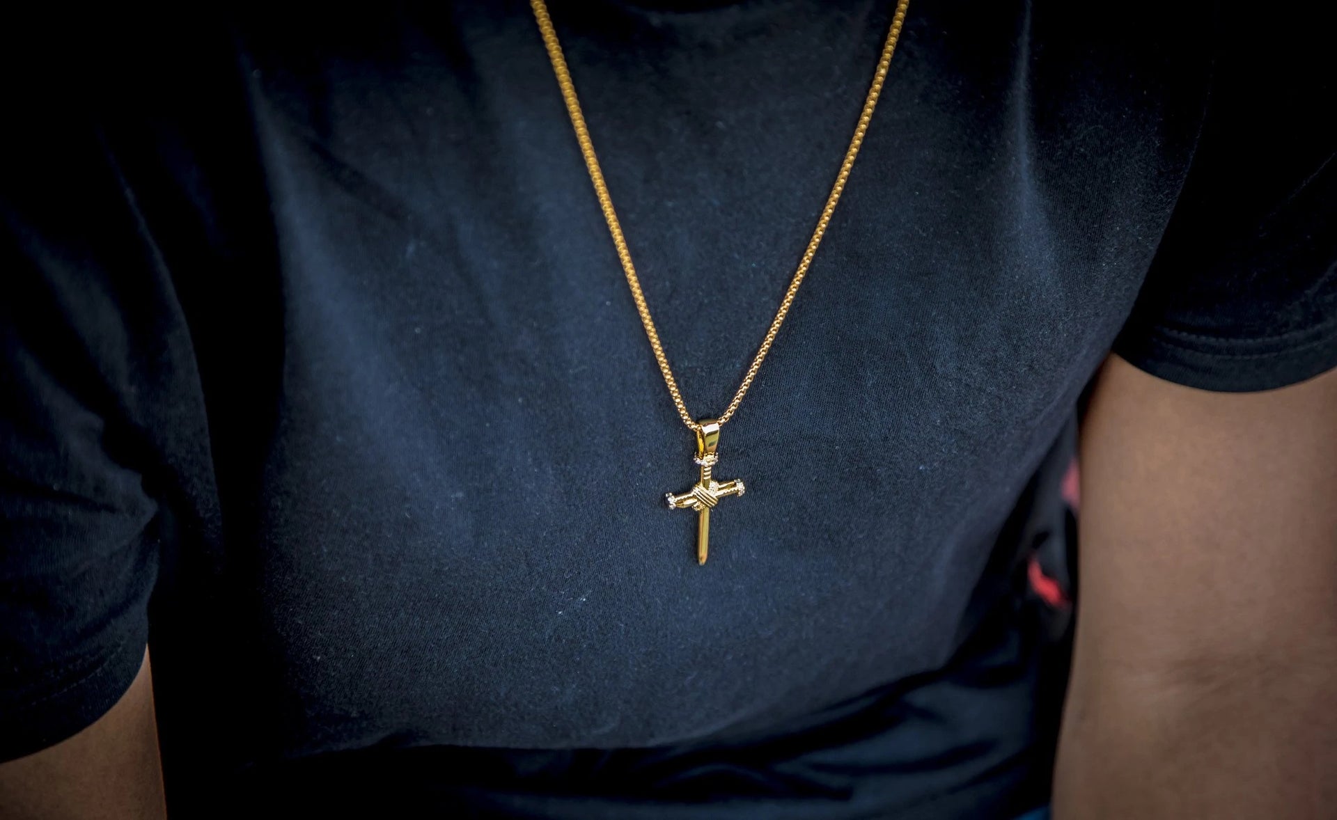 The 18K Gold Plated Nail Cross Pendant | Golden Gilt being worn