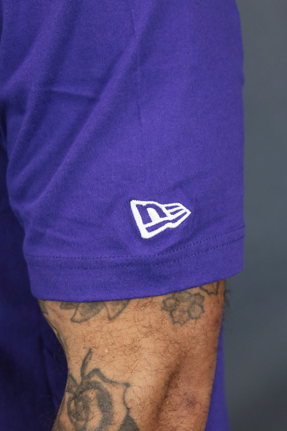 The wearer's right on the Arizona Diamondbacks State Flower Cooperstown Shirt | New Era Purple