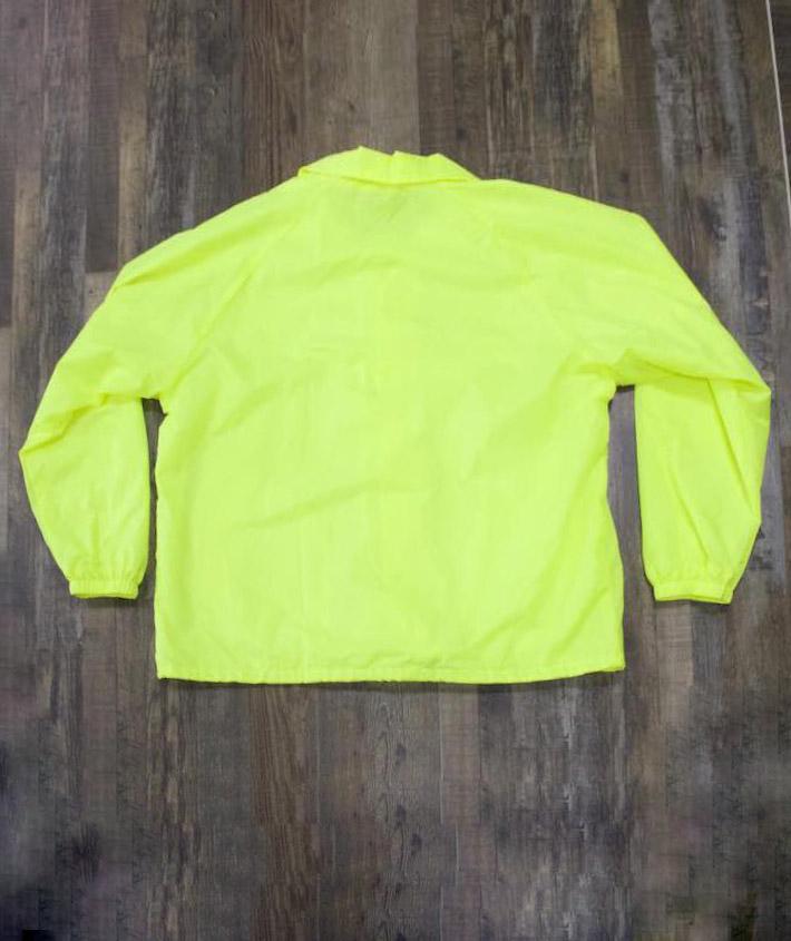 the back of the Police Public Safety | Waterproof Safety Green Windbreaker | Waterproof Neon Yellow Flannel Lined Coach Jacket is fluorescent yellow