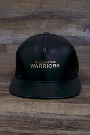 the Golden State Warriors Leather Snapback | Black Warriors Snap Back with Gold Foil Design has a gold logo on the front