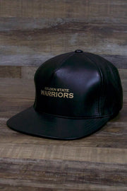 the Golden State Warriors Leather Snapback | Black Warriors Snap Back with Gold Foil Design is made of real leather