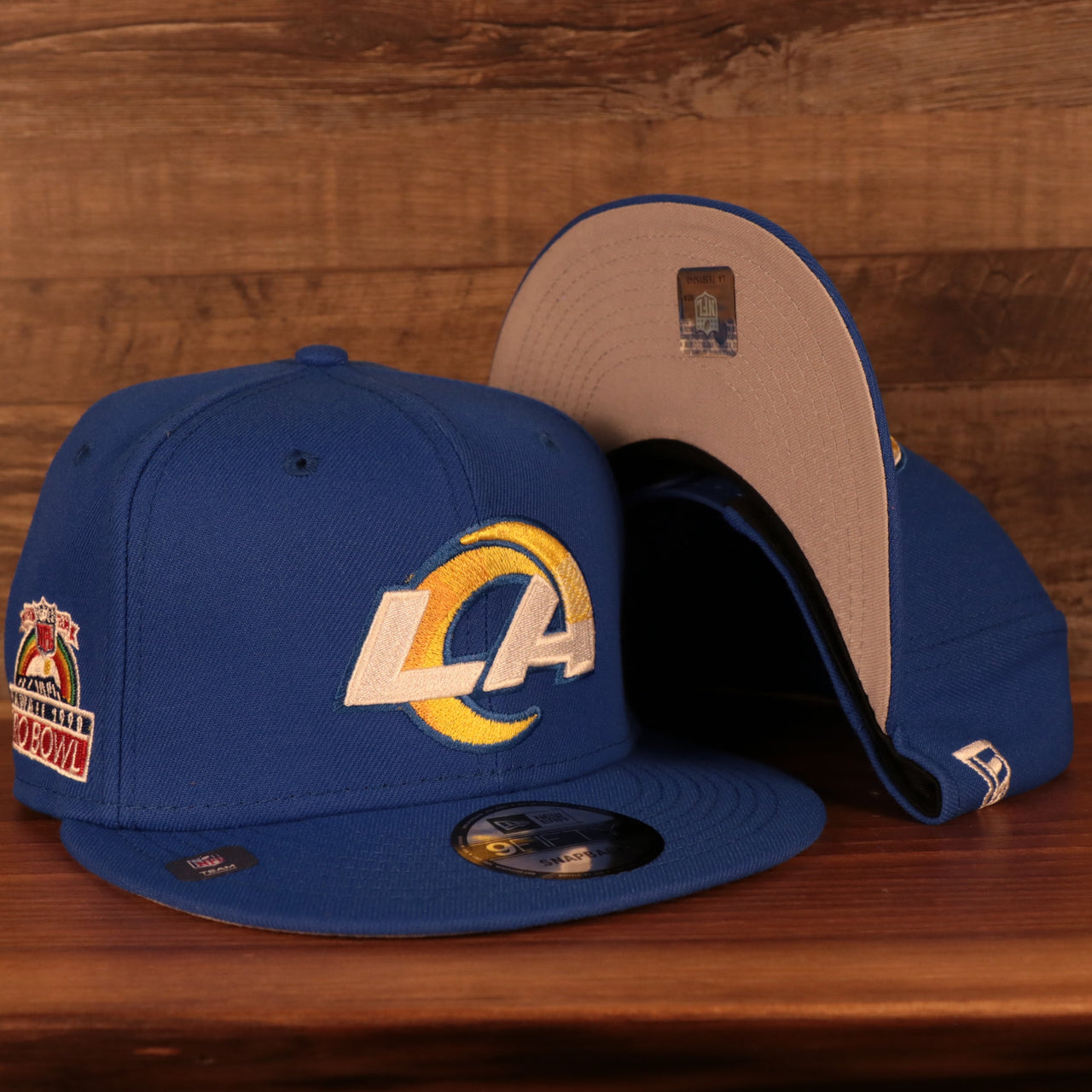 front and bottom of the Los Angeles Rams "Patch Up" 1990 Pro Bowl Side Patch Gray Bottom 59Fifty Royal Fitted Cap