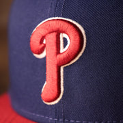 The Phillies Logo on the Philadelphia Phillies Blue on Red Game Authentic 59Fifty Fitted Cap