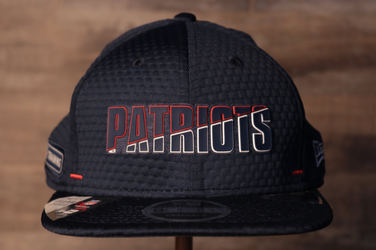 Patriots 2020 Training Camp Snapback Hat | New England Patriots 2020 On-Field Navy Training Camp Snap Cap the front of this patriots cap has the patriots name