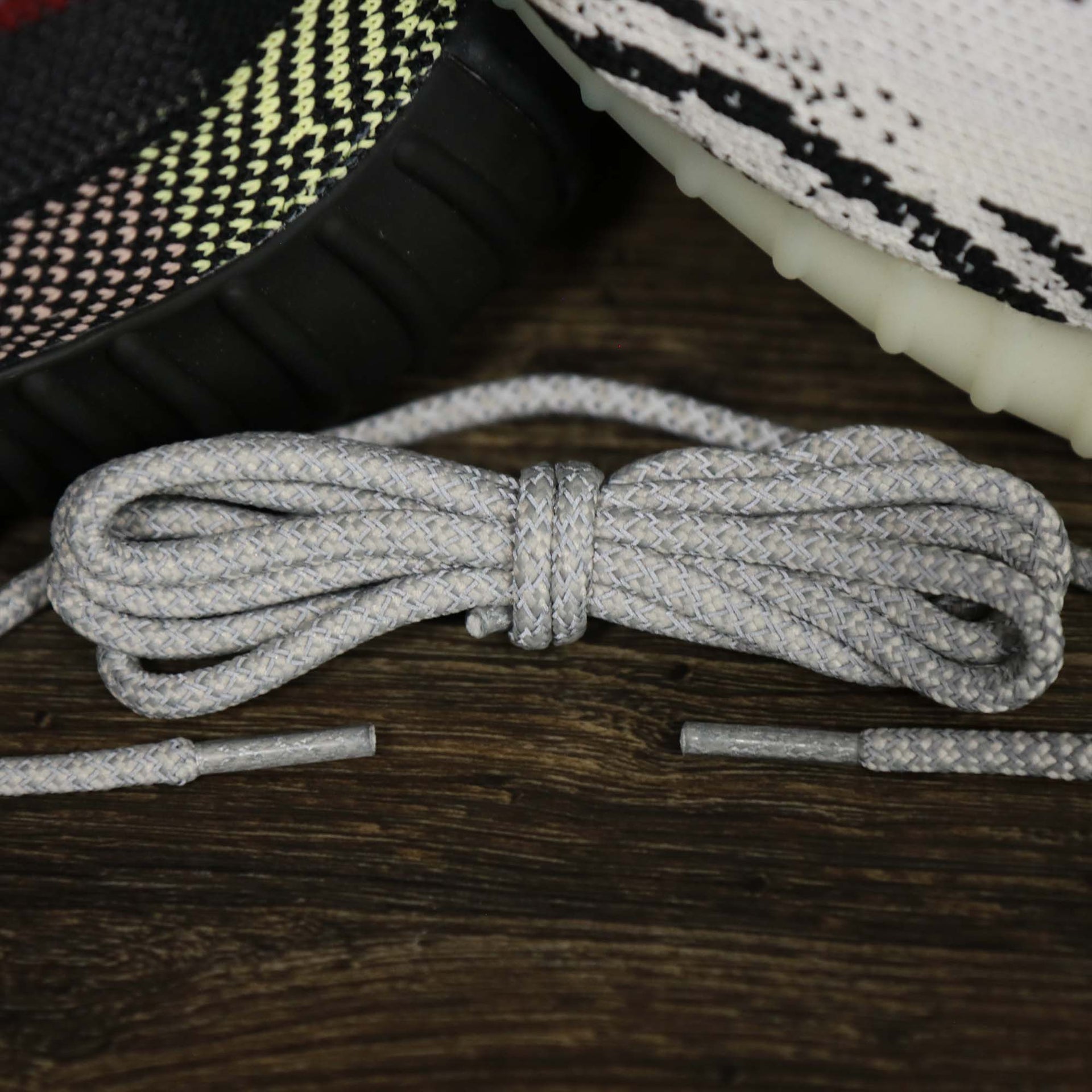 The 3M Reflective White/Gravel Solid Shoelaces with White/Gravel Aglets | 120cm Capswag reflecting and unfolded