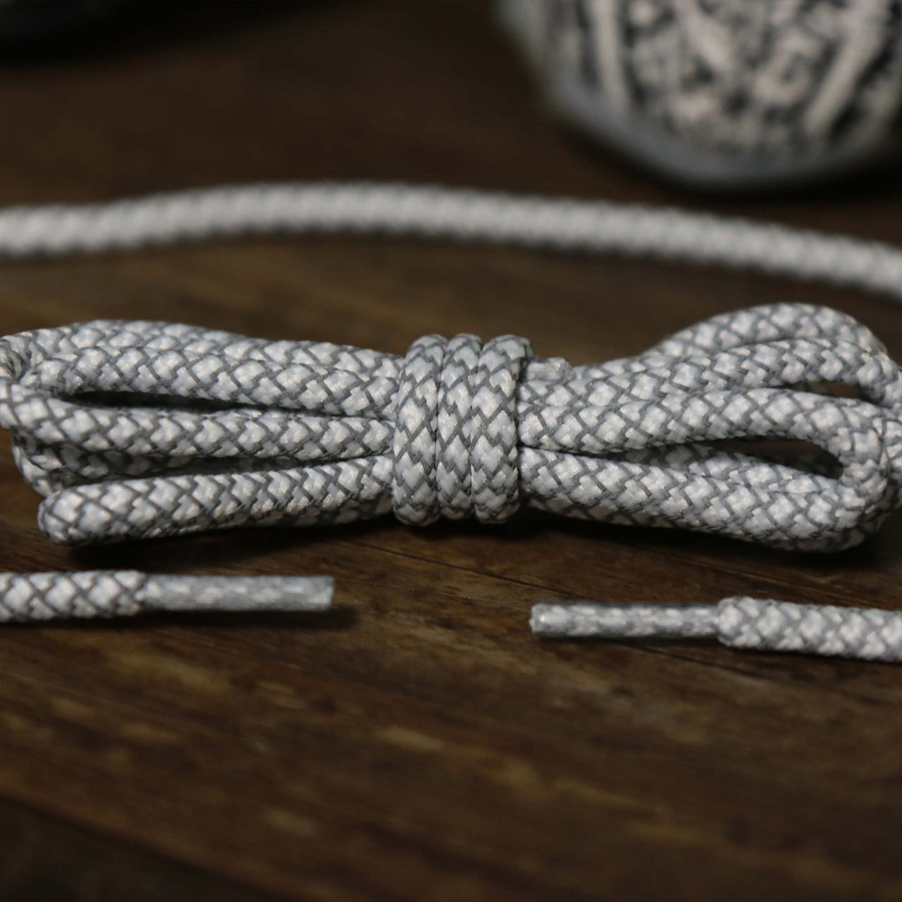 The 3M Reflective White/Ice Gray Solid Shoelaces with White/Ice Gray Aglets | 120cm Capswag unfolded
