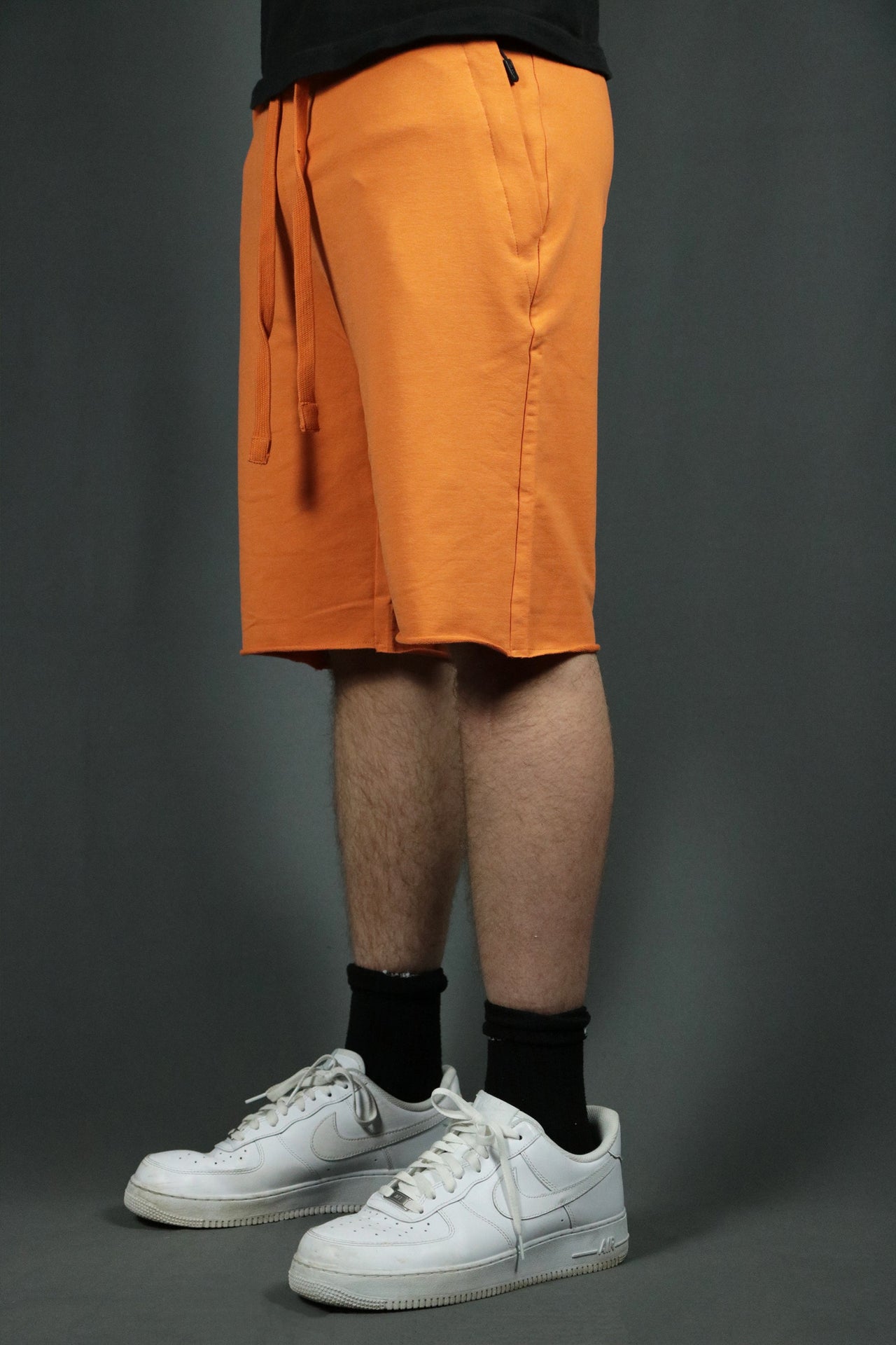 The orange mens french terry shorts by Jordan Craig.