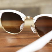 The inside of the Round Frame Brown Gradient Lens Sunglasses with White Gold Frame