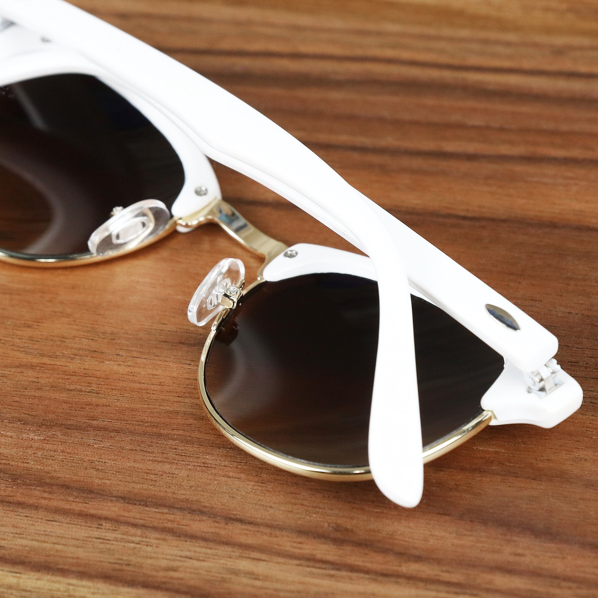 The Round Frame Brown Gradient Lens Sunglasses with White Gold Frame folded up