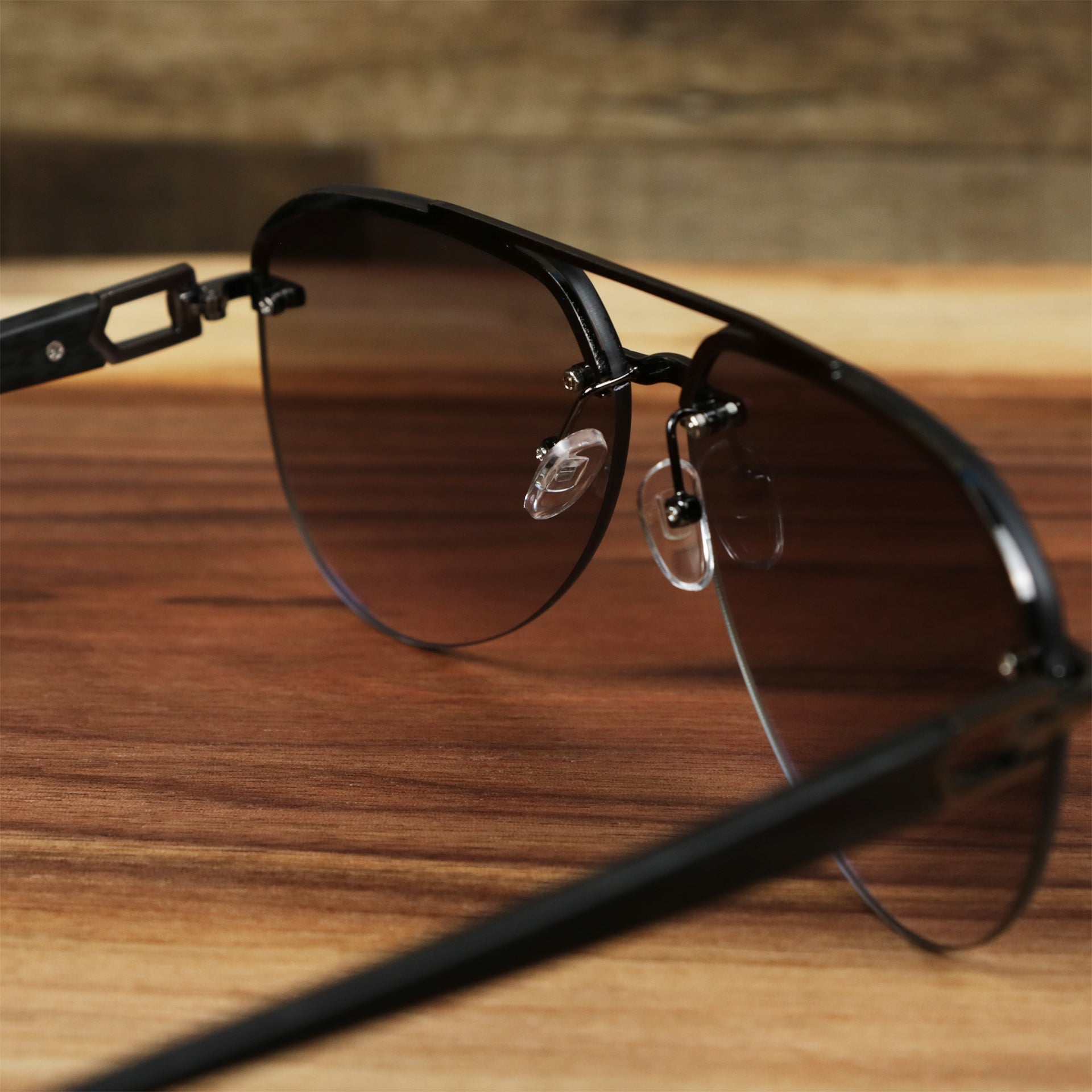 The inside of the Round Aviator Frames Black Lens Sunglasses with Gold Frame