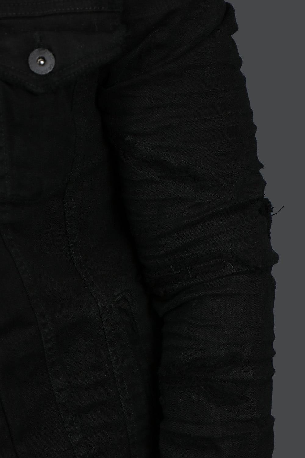 The wearer's left of the Black Streetwear Denim Jacket | Jordan Craig