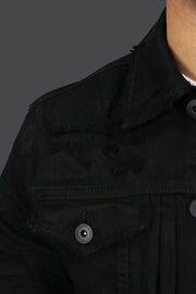 A close up of the chest pocket on the Black Streetwear Denim Jacket | Jordan Craig