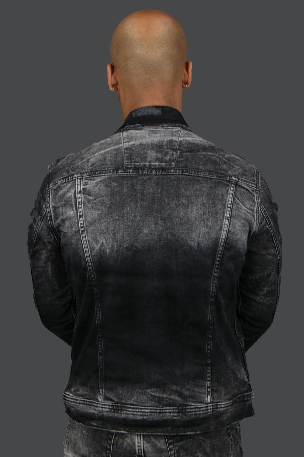 The backside of the Industrial Black Distressed Denim Jacket | Jordan Craig