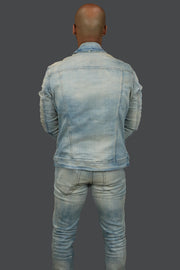 The backside of the Iced Lager Distressed Denim Jacket | Jordan Craig with the matching denim pants