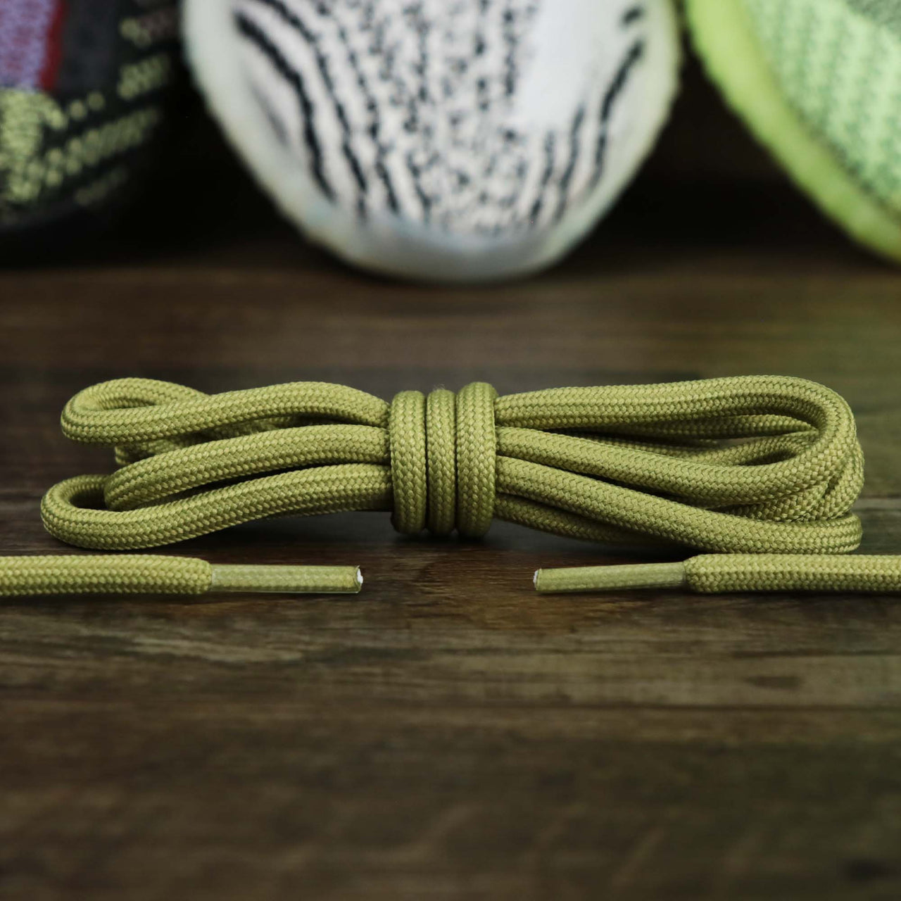 The Solid Rope Light Green Shoelaces with Light Green Aglets | 120cm Capswag folded up