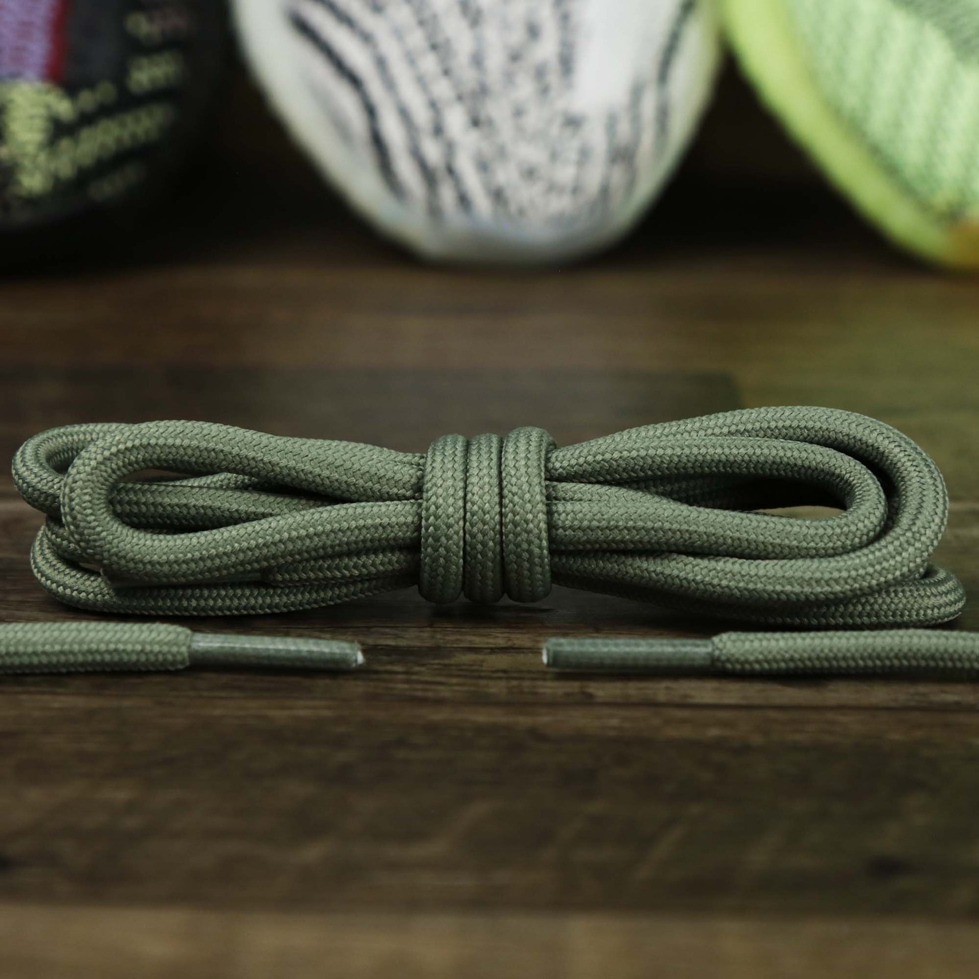 The Solid Rope Military Green Shoelaces with Military Green Aglets | 120cm Capswag folded up