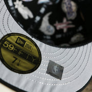 The undervisor on the NBA Logo All Over patch fitted 59Fifty Cap with Gray Bottom | Black