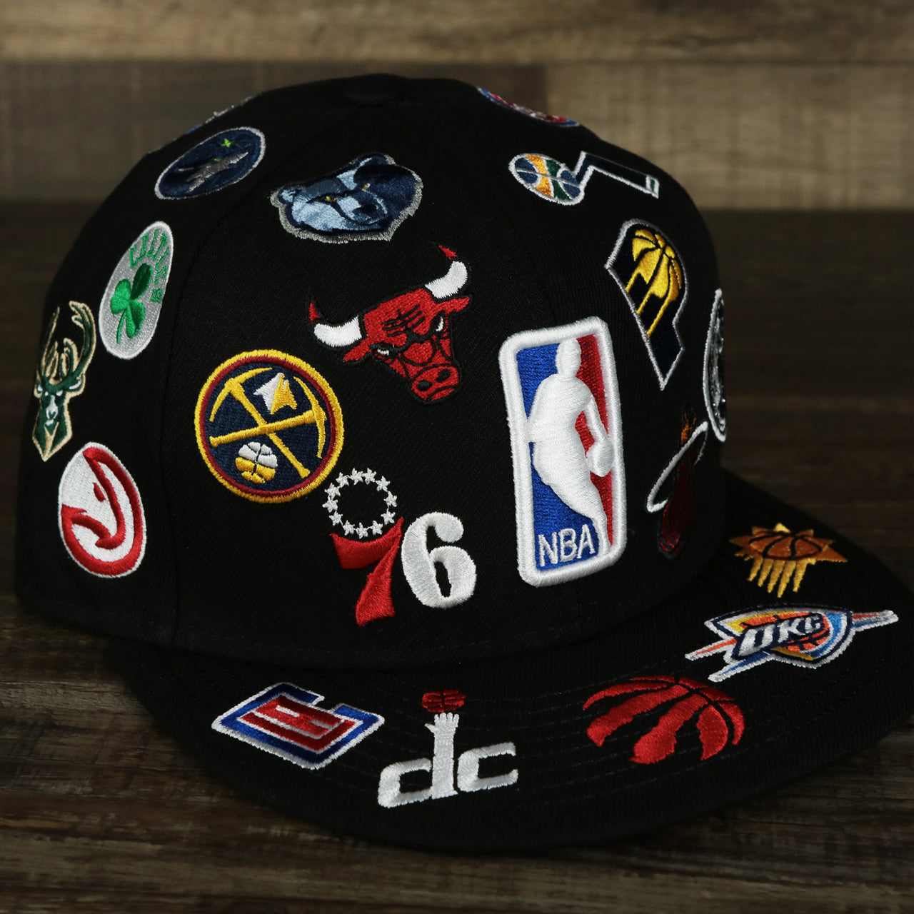 The NBA Logo All Over patch fitted 59Fifty Cap with Gray Bottom | Black