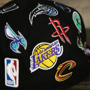 The NBA logo on the NBA Logo All Over patch fitted 59Fifty Cap with Gray Bottom | Black