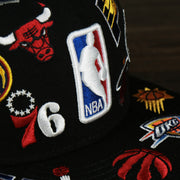 The NBA logo on the NBA Logo All Over patch fitted 59Fifty Cap with Gray Bottom | Black
