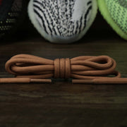 The Solid Rope Old Gold Shoelaces with Old Gold Aglets | 120cm Capswag folded up