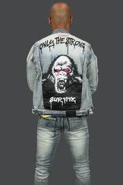 The back of the Only The Strong Custom Spray Painted Denim Jacket Motive Denim | Vintage |  with matching Only The Strong Graphic Tee fromMotive Denim and Motive Denim Custom Graphic Denim Jeans.
