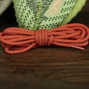 The 3M Reflective Orange Solid Shoelaces with Orange Aglets | 120cm Capswag folded up
