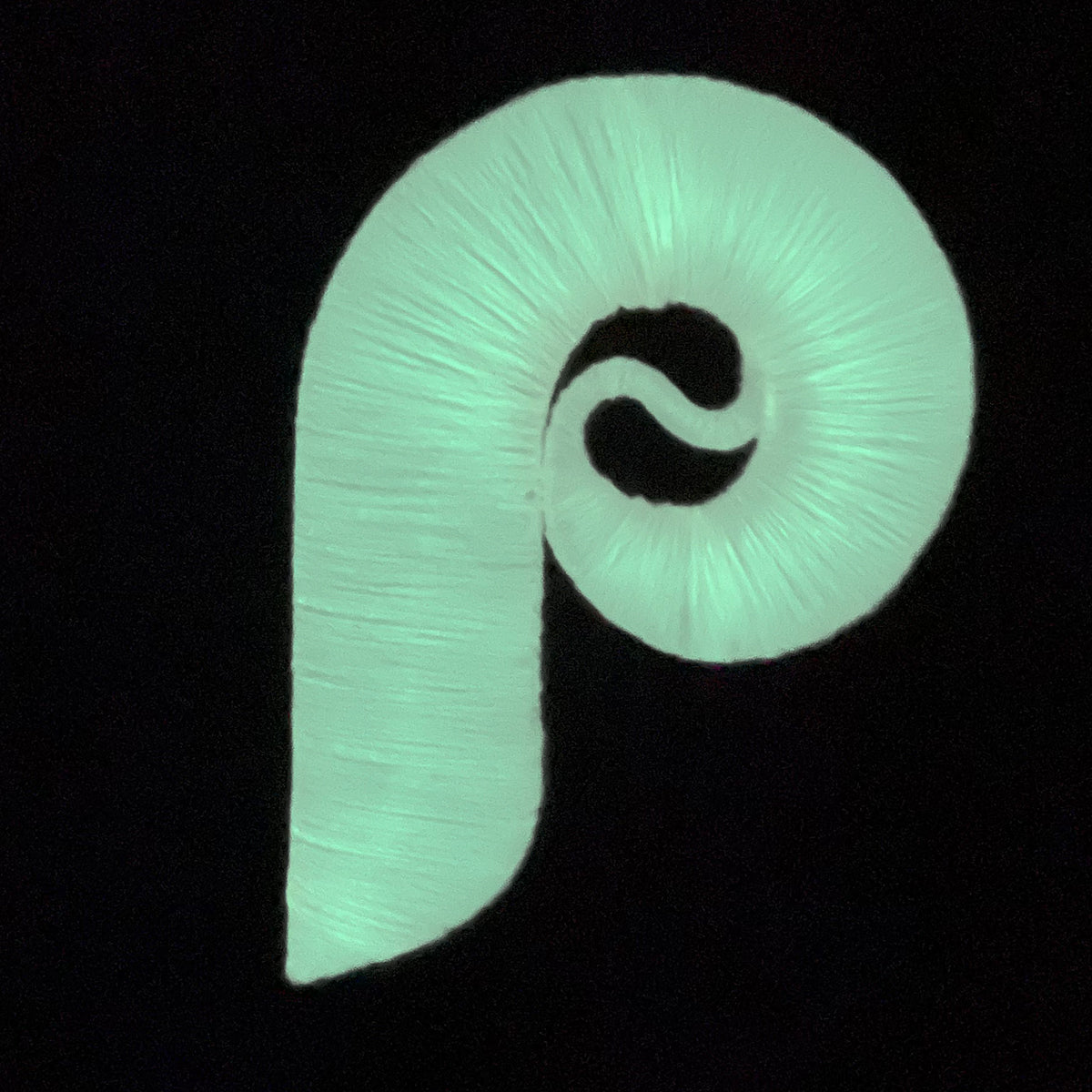 Glow in the dark Philadelphia Phillies logo of the Philadelphia Phillies Glow In The Dark 100th Anniversary Teal Bottom Side Patch 59Fifty Fitted Cap