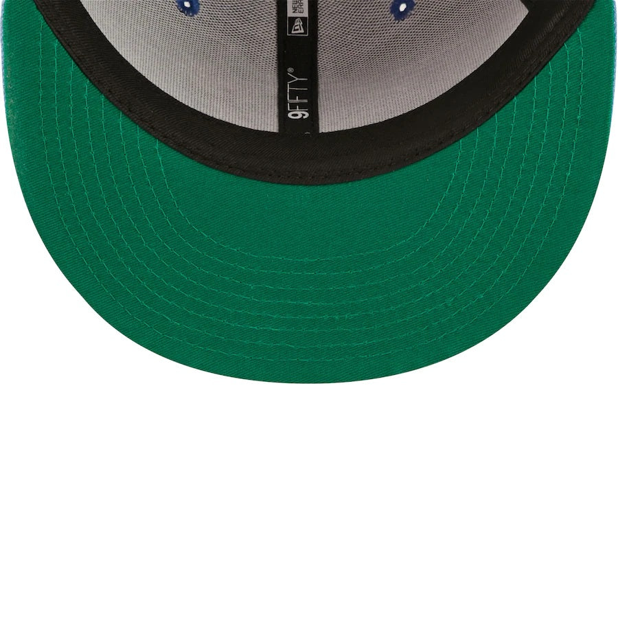 The undervisor on the Toronto Blue Jays Cooperstown Green Bottom Light Blue Letter Arch 9Fifty Snapback Cap | Back Word Arch Royal Blue 9Fifty