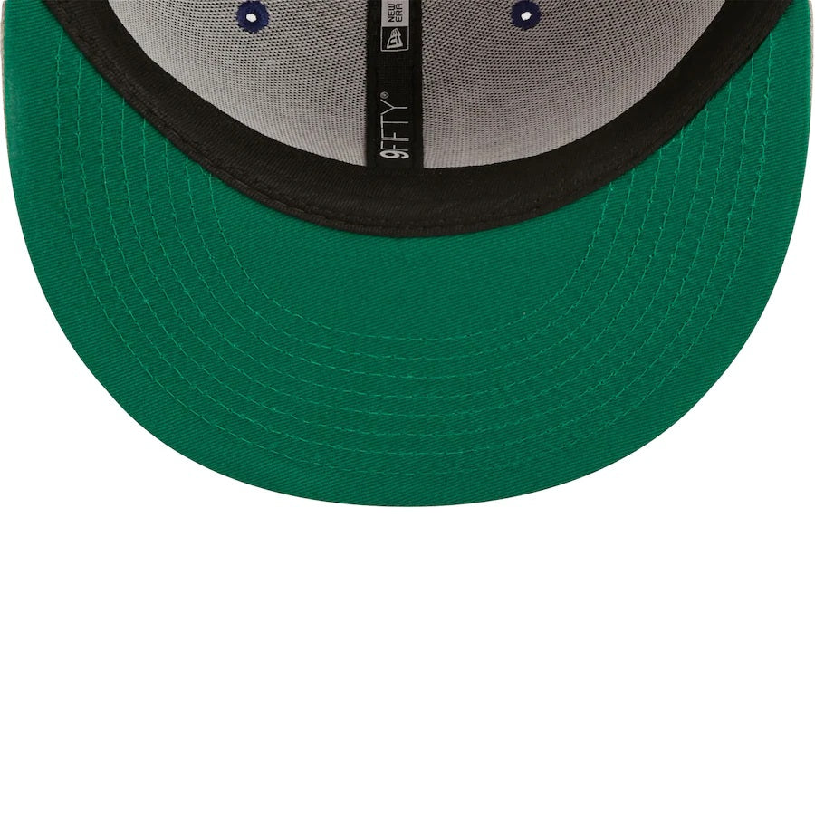 The undervisor on the Los Angeles Dodgers Silver Letter Arch Retro Green Bottom 9Fifty Snapback Cap | Back Letter Arch Blue 9Fifty